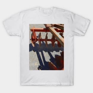 Red Disk Plough  by Avril Thomas T-Shirt